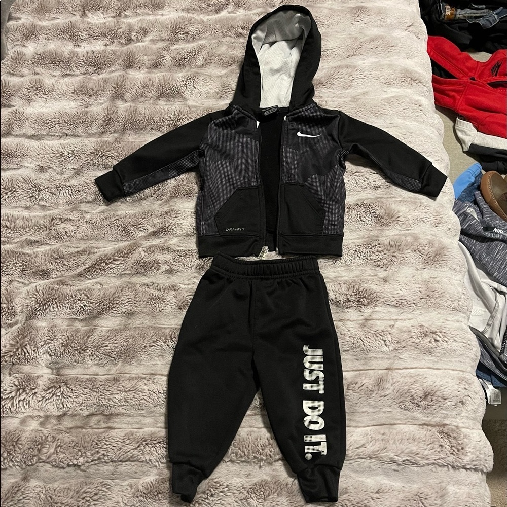 Nike 12 months track suit. Black and white.